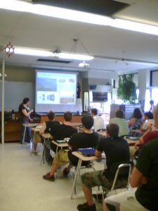 teacher showing slides to a class